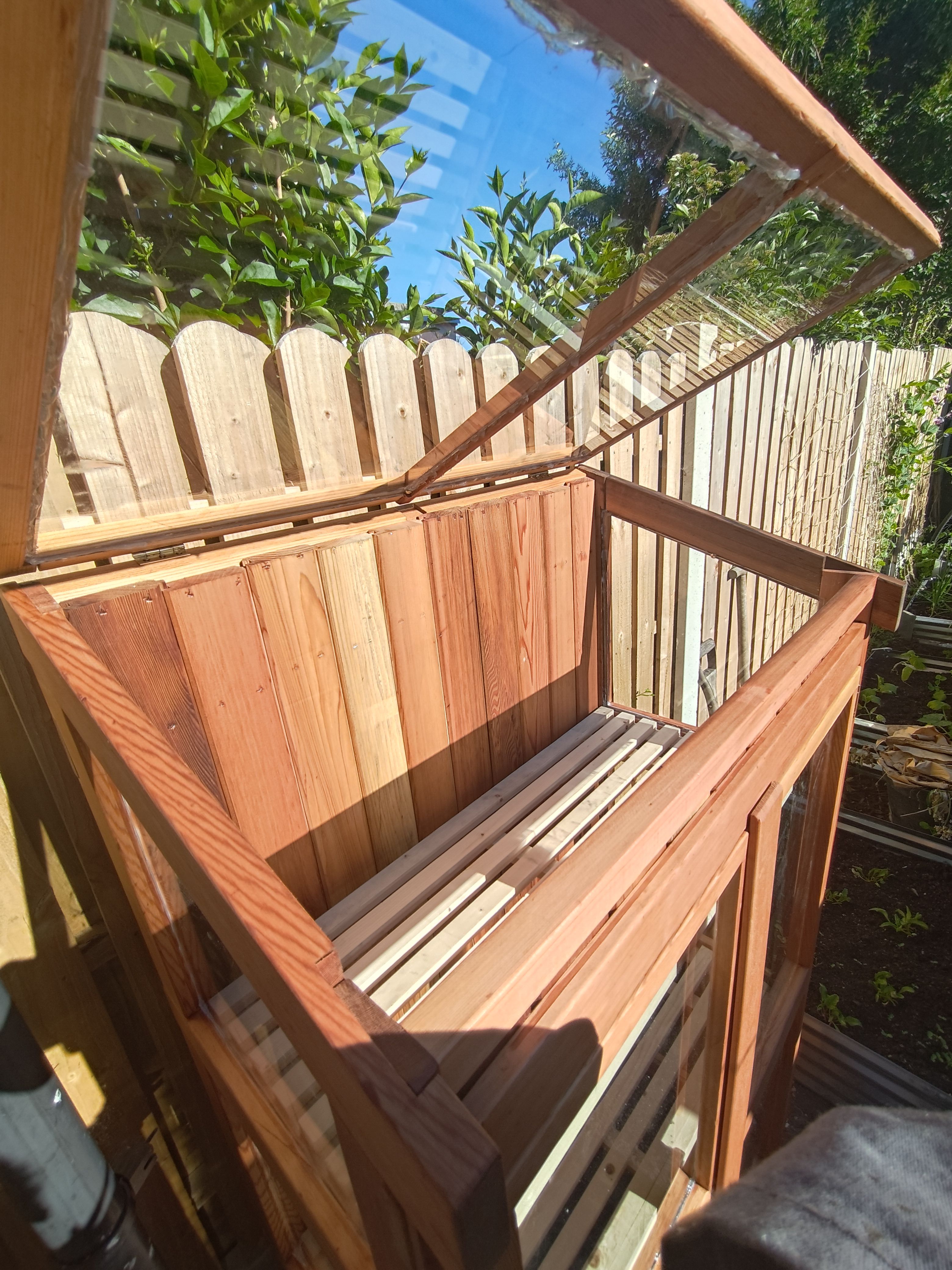 Showing the hinged top frame